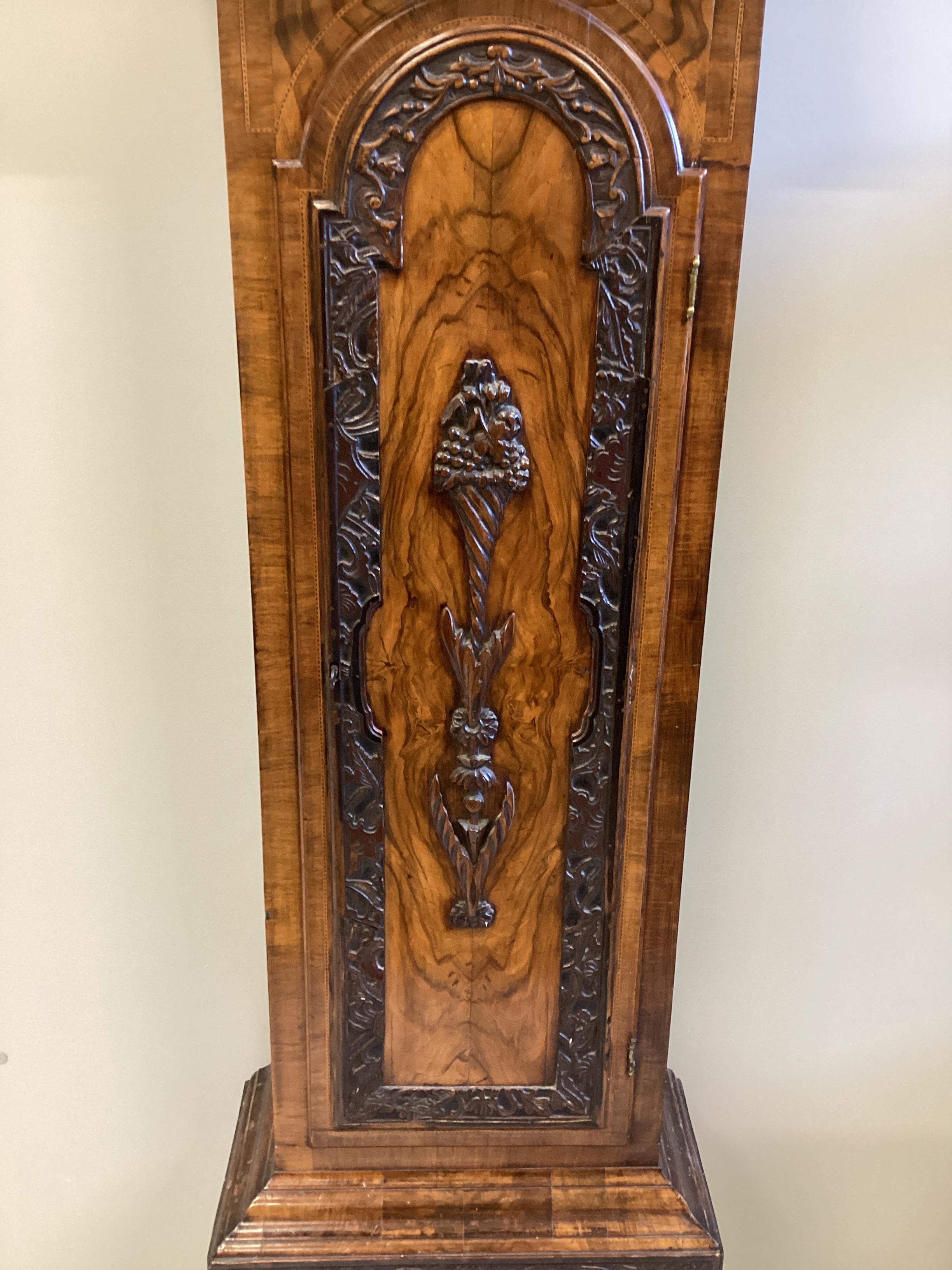 An 18th century figured walnut and oak eight day longcase clock, marked Thomas Jarvis, London, height 230cm
